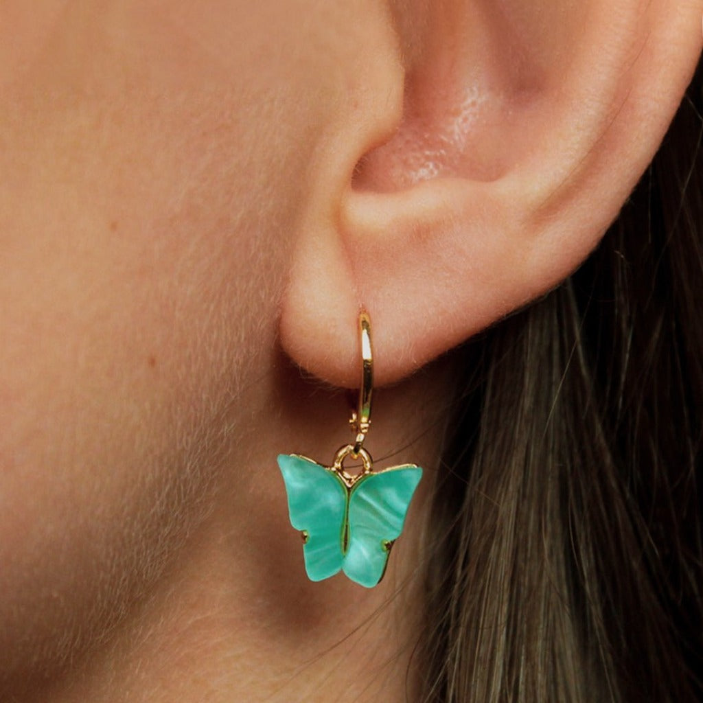 Butterfly Aquamarine 5 mm earrings SFJ medical plastic  Beauty Direct